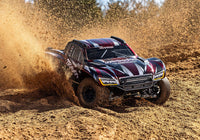 [Action] Traxxas Maxx Slash 6S - kırmızı kaporta arazide toz savurarak köşe alış