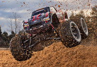 [Action] Traxxas X-Maxx Belted - kırmızı araç havada atlayış yaparken
