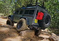 [Action] Traxxas TRX-4 Defender Combo - Koyu Defender orman patikasında arkadan yedek bidon ve plaka detayı