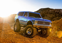 [Action] Traxxas K5 Blazer Combo - mavi gövde arazide gün batımı