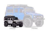 [Action] Traxxas TRX-4M Defender - turuncu araç toprak arazide