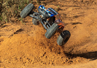 [Action] Traxxas Wide Maxx - Turuncu gövde toprak zeminde atlama